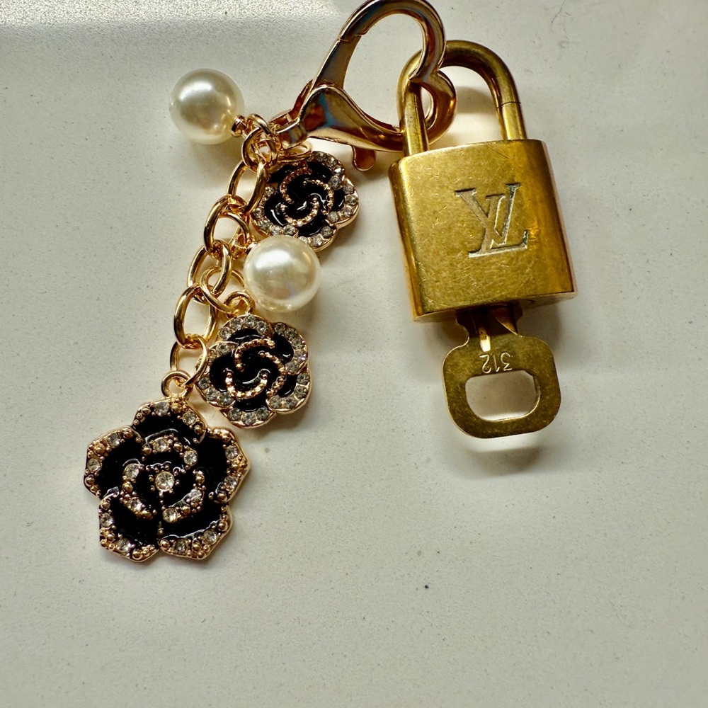 Louis Vuitton Gold Lock and Key and unbranded Black Flower Keychain/Bag Charm